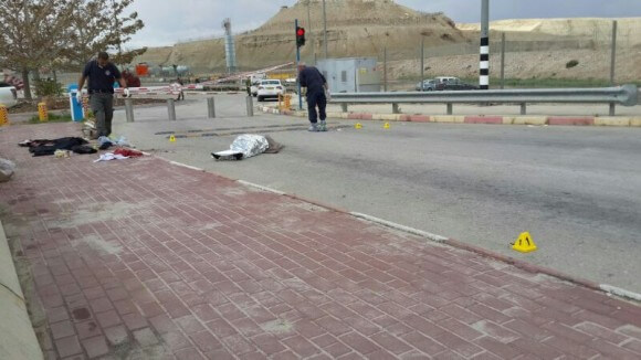 Raed Zuaiter lying dead at the Allenby Bridge on March 10. 