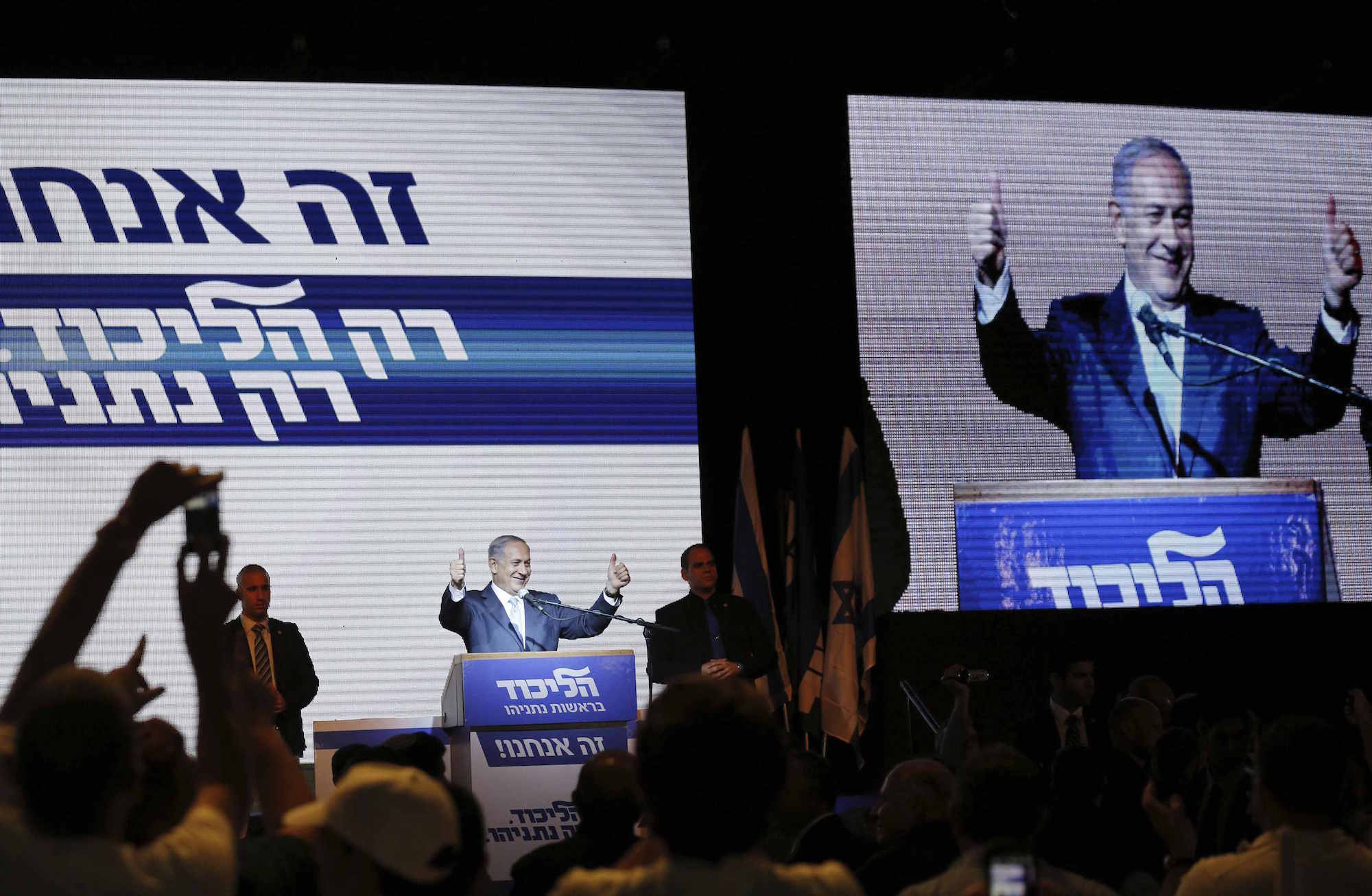 Israeli Prime Minister Benjamin Netanyahu gestures to supporters at party headquarters in Tel Aviv March 18, 2015. (Photo: REUTERS/Amir Cohen)