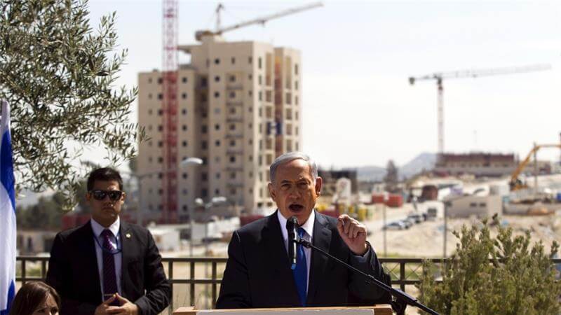 Netanyahu vows to expand the settlements during a 2015 campaign stop at Har Homa.