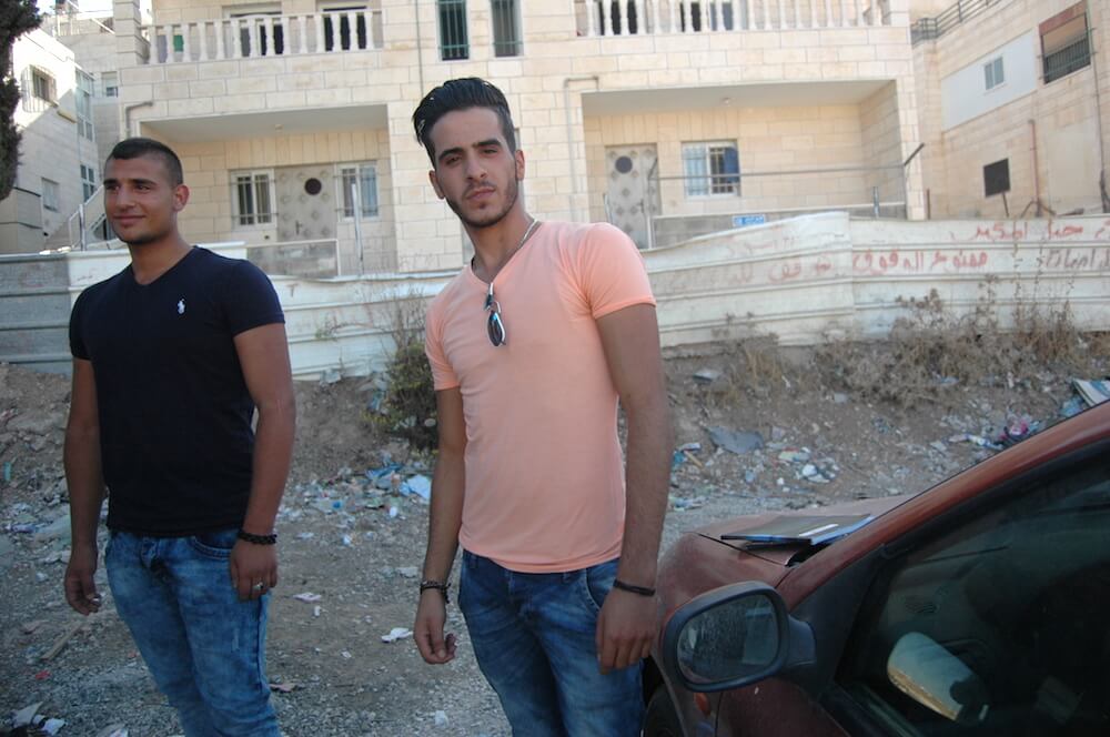 (R) Mohammed Ashqir, 18, and Ahmed Kamwer, 18 in Jabel Mukaber, East Jerusalem. (Photo: Allison Deger)