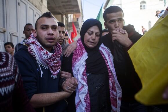 Khalid Mahmoud al-Jawabreh's mother leads funeral procession