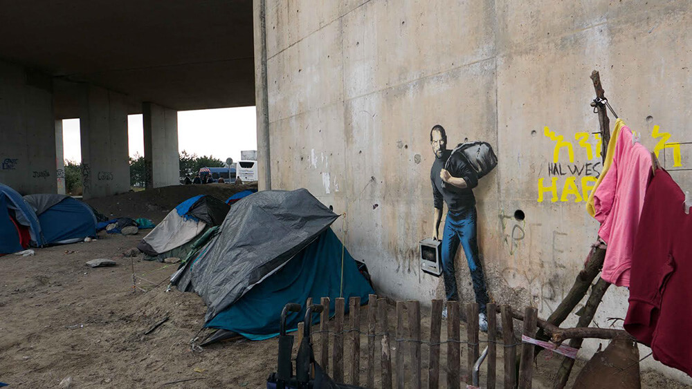 "The Jungle refugee camp, Calais" Photo: Banksy