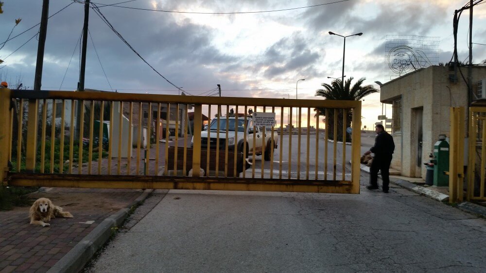 The gate of Ofra settlement closing the orthodox community for the Sabbath, Jan. 15, 2016 (Photo by Philip Weiss)