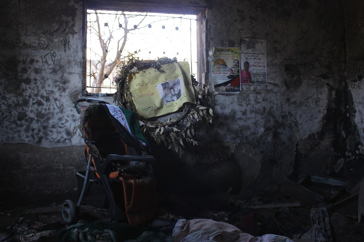 The burned out bedroom of the Dawabsha family home after extremist settlers firebombed the house, killing Riham, Sa'ad, and 18-month-old Ali Dawabsha. (Photo: Matthew Vickery)