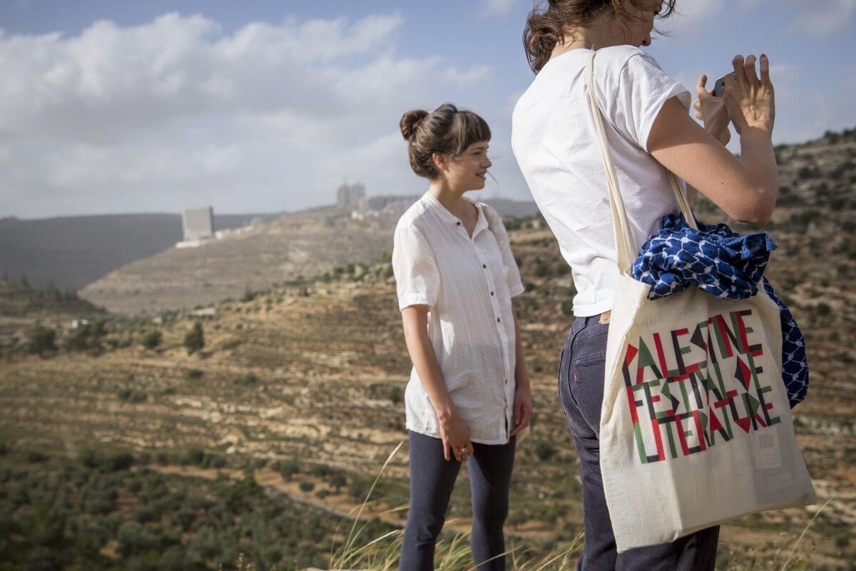 Palfest artists walk in the hills on the outskirts of Ramallah on June 5 2014 in Ramallah, Palestine. (Photo: Rob Stothard for The Palestine Festival of Literature)