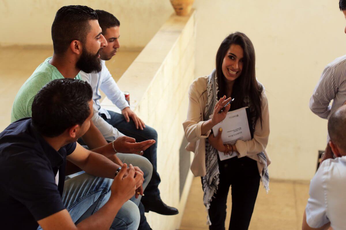 Dana Rwaidy meets with some of her classmates, several of whom are also in student government. (Photo: Abed al Qais)