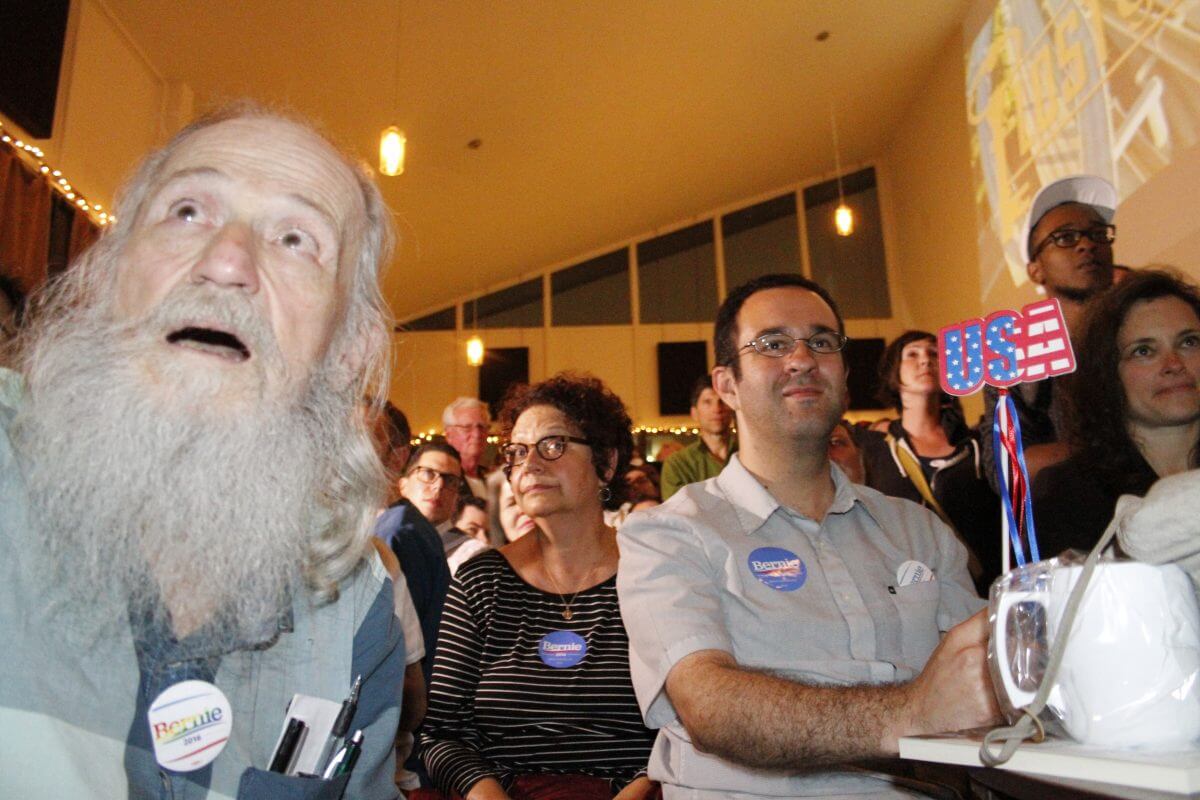 The audience reacts to Sanders saying he will work with President Barack Obama. (Photo: Wilson Dizard) 