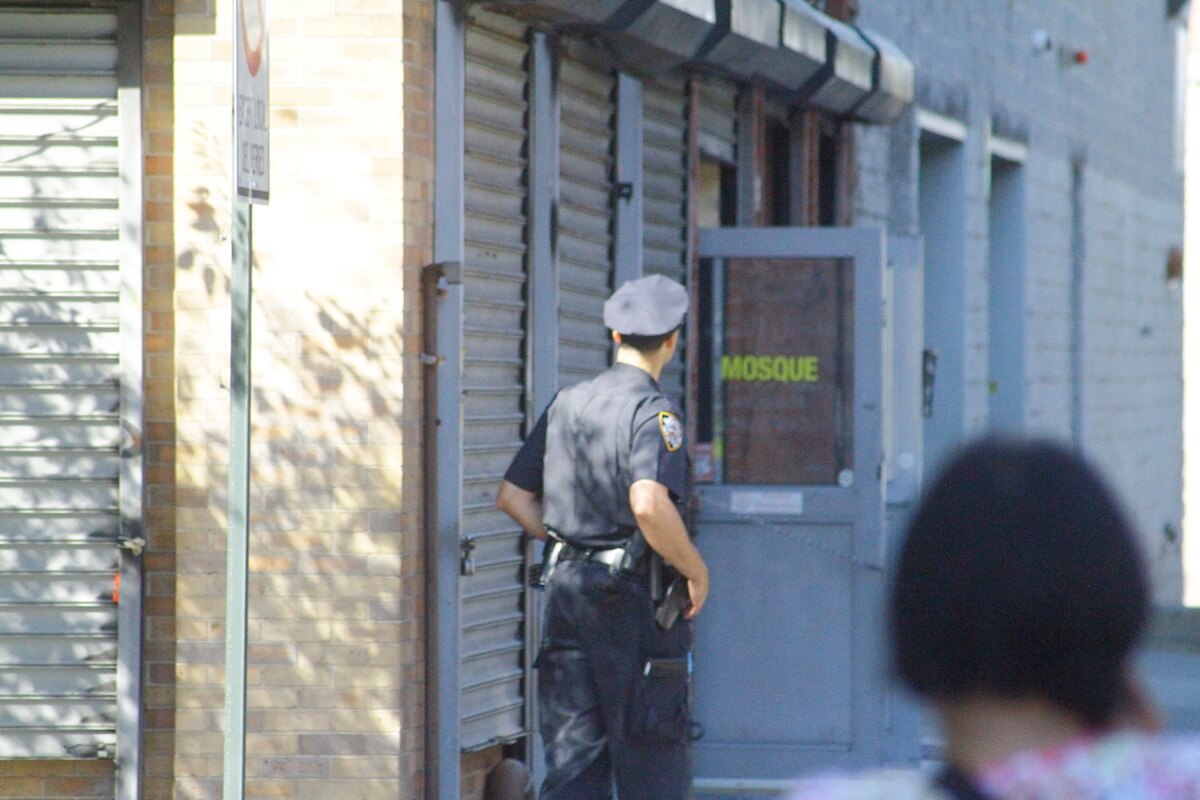 Security stationed outside the mosque. (Photo: Wilson Dizard)