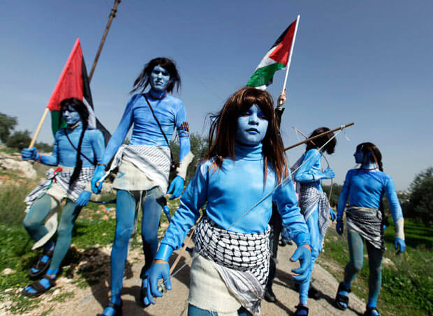 Palestinians dressed as the Navi from James Cameron's "Avatar" protesting the Israeli occupation.