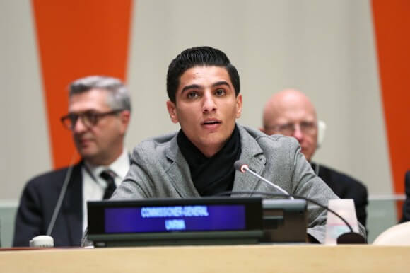 Mohammed Assaf, UNRWA Regional Youth Ambassador and Winner of Arab Idol 2013 addresses the meeting. UN Photo/Ryan Brown