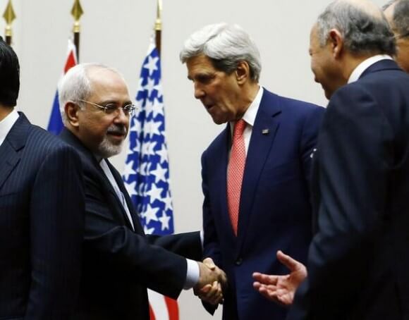 Foreign Minister Zarif and Secretary of State Kerry shake hands