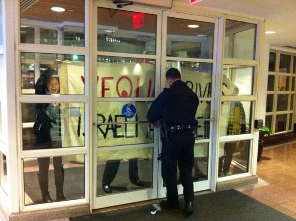 Protesting Veolia's CEO at the Harvard Kennedy School.