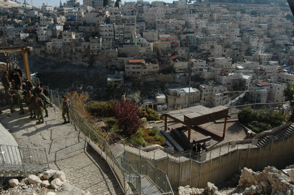 The City of David archaeological site, run by the Israeli settler organization the Elad Foundation, overlooks the Palestinian neighborhood of Silwan in East Jerusalem. (Photo: Allison Deger/Mondoweiss)
