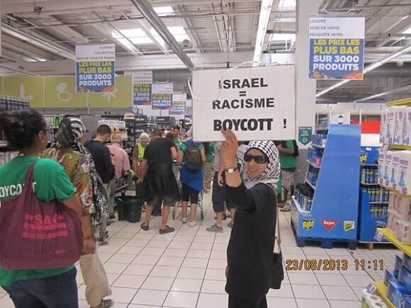 BDS action in France. (Photo via The Alternative Information Center)