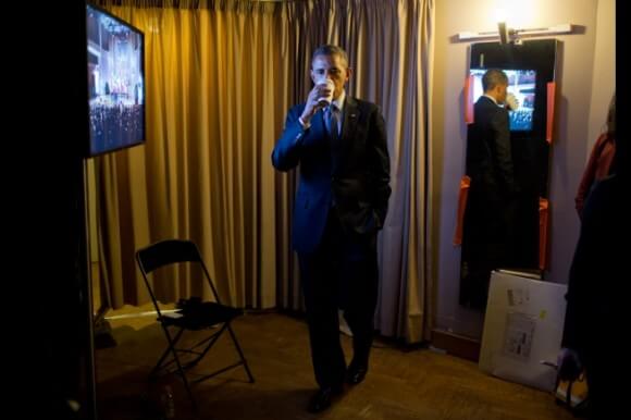 Obama drinks tea before his speech yesterday in Brussels, White House photo by Pete Souza