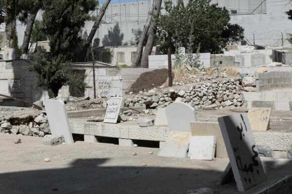 Muslim cemetery damaged by Israeli wall