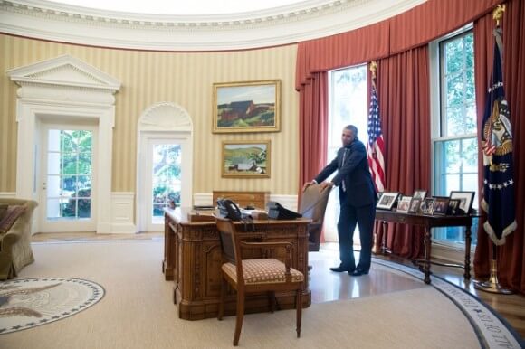 Obama on the phone to an Afghan leader, July 25, photo by Pete Souza
