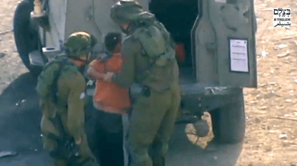 Screen shot: B'tselem Israeli Soldiers detain developmentally-disabled Palestinian child in Hebron, 19 Oct. 2014