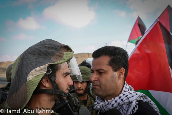Blocking the Jericho road colonial road to Jerusalem November 28, 2014 (Photo: Hamde Abu Rahma)