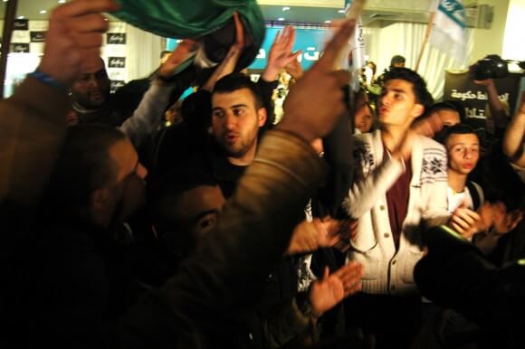 Arab youth chant national songs at election results event in Narazeth, Israel, Tuesday, March 17, 2015. (Photo: Allison Deger)