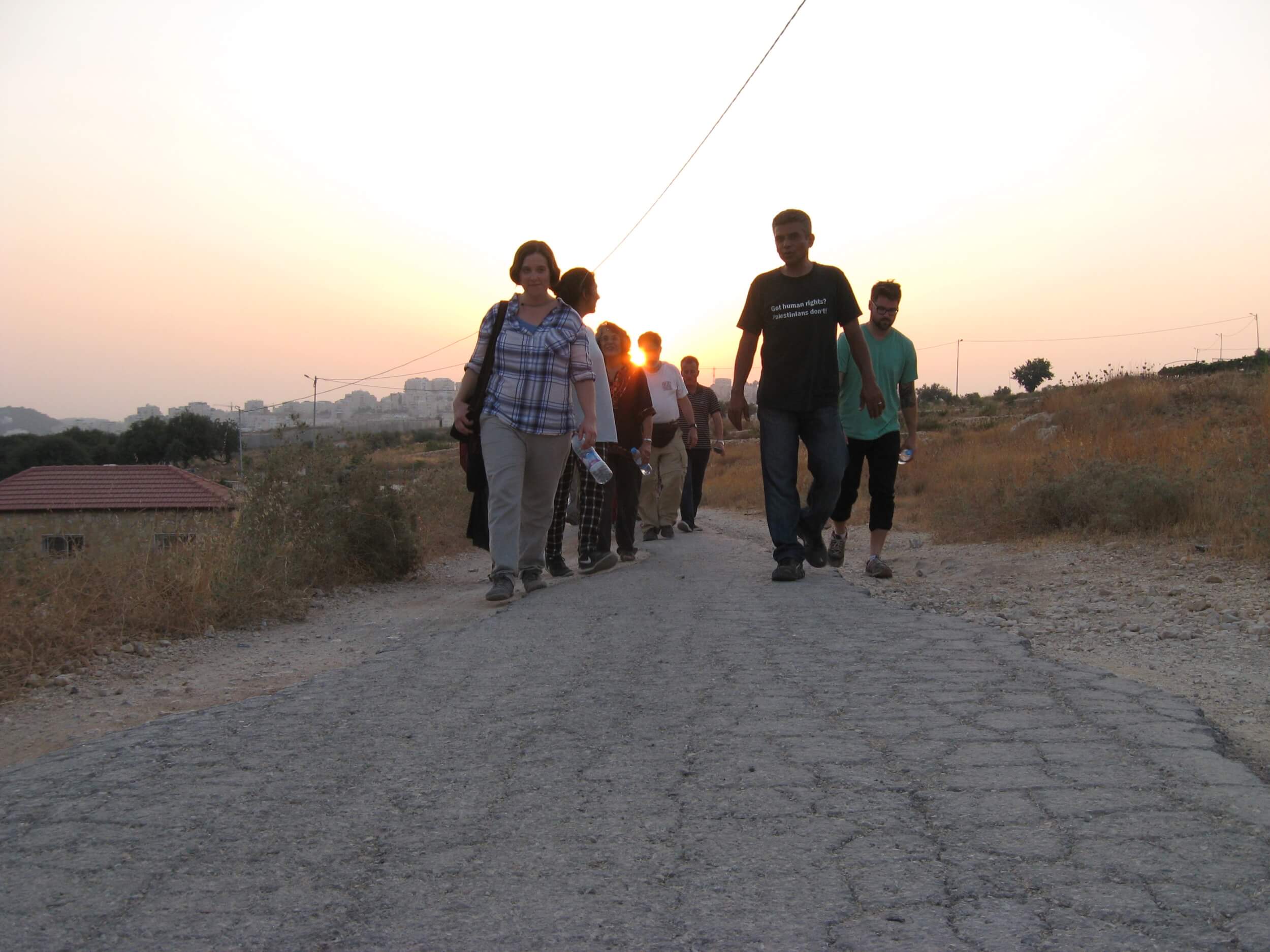 Interfaith Peace Builders delegation walking in Bil'in. (Photo: IFPB)