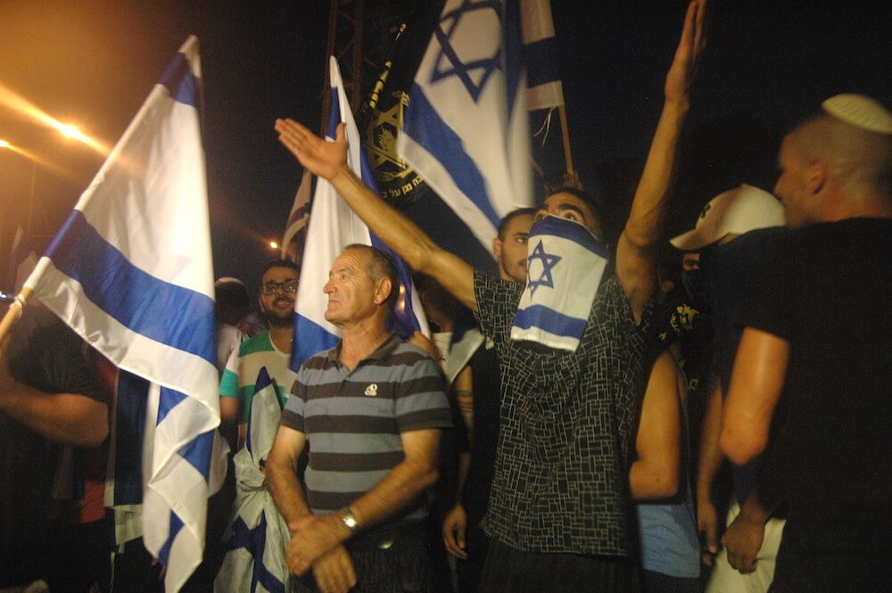 Israeli right-wing residents of Ashkelon protest the presence of Palestinians inside of the town. (Photo: Allison Deger)