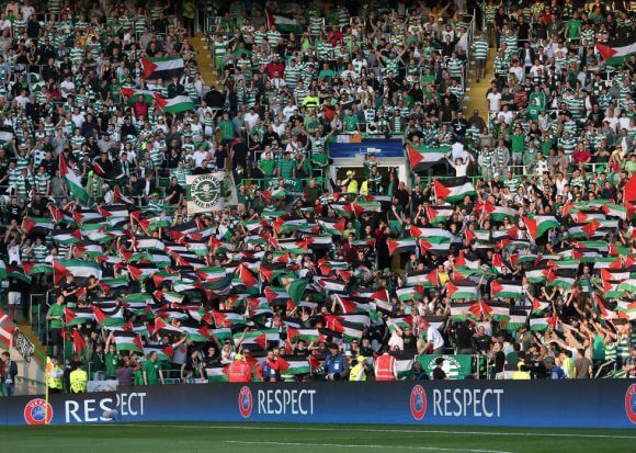 Celtic FC fans hold up Palestinian flags during a match against Israel's Hapoel Beer Sheva in 2016 (Photo: Reuters)