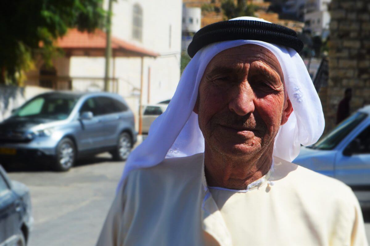 An elderly resident of Sair tells Mondoweiss that the current climate is worse than it has been since the Second Intifada. (Photo: Sheren Khalel)
