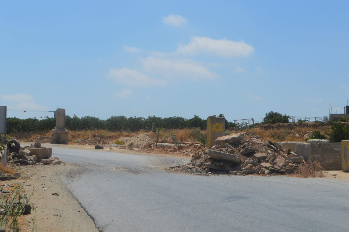 Since October, when Israeli forces do open certain entrances to the village, they leave rubble and concrete blocks behind, as to make the next closure easier and more efficient. (Photo: Sheren Khalel)