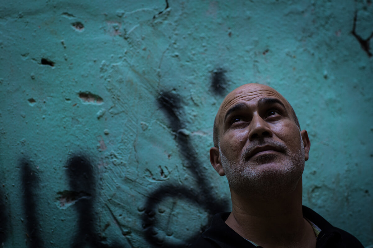 Bourj el Barajneh Camp, Beirut, Lebanon - 15/10/2016: Nasr el khateeb is 47 years old and runs a shop in the camp. “My parents told him about Palestine, how beautiful it is, and the importance of geographical position. My grandmother stayed there and died there. My father left their lands and just took his keys with him to Lebanon. They were happy until the occupation kicked them out. The Palestinian accent, the social life and cuisine remind me of Palestinian culture.” (Photo: Celia Peterson)