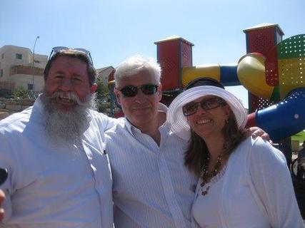 David and Tammy Friedman at a playground which they dedicated in the Bet El settlement, with Former MK and Bet El Founder Yaakov Katz. Baruch Gordon. (Photo: Arutz Sheva)