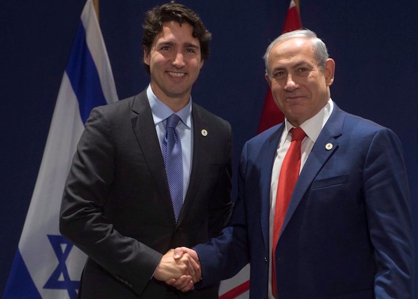 Israeli Prime Minister Benjamin Netanyahu shakes hands with Canadian Prime Minister Justin Trudeau (Photo: Adrian Wyld/Canadian Press)