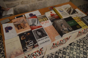 Books written by guests of the festival on display for sale at the Nablus event. (Photo: Mondoweiss/Sheren Khalel)