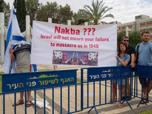 Im Tirtzu protesting a Nakba commemoration at Tel Aviv University, May 2013. (Photo: Lazar Simeonov)