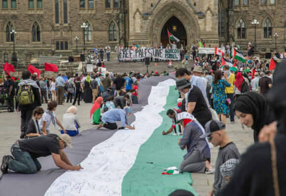 Protest in front of Canada's parliament, 2014. (Photo: Tony Webster)