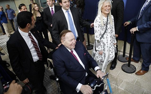 Sheldon and Miriam Adelson at the opening of the US embassy in Jerusalem, May 14, 2018. Miriam wears a dress that bears message from biblical Psalms: "If I forget thee Jerusalem, let my right hand forget its skill."
