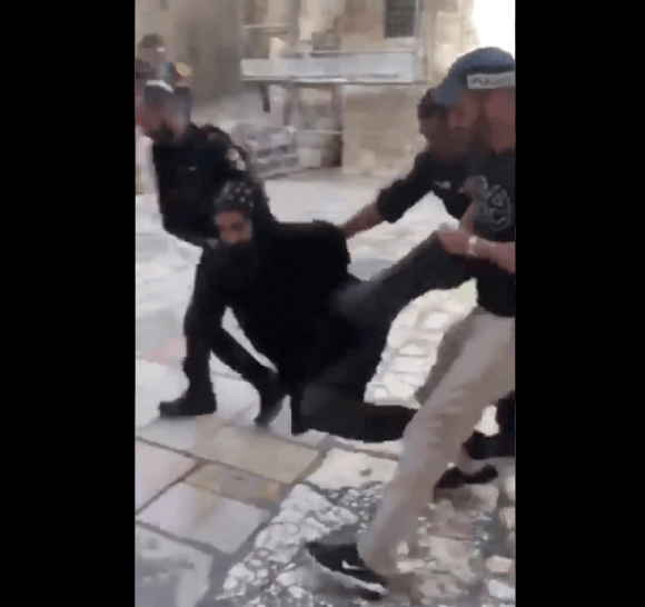 Israeli police arrest Coptic priests protesting outside of the Church of Holy Sepulchre in Jerusalem, October 24, 2018.