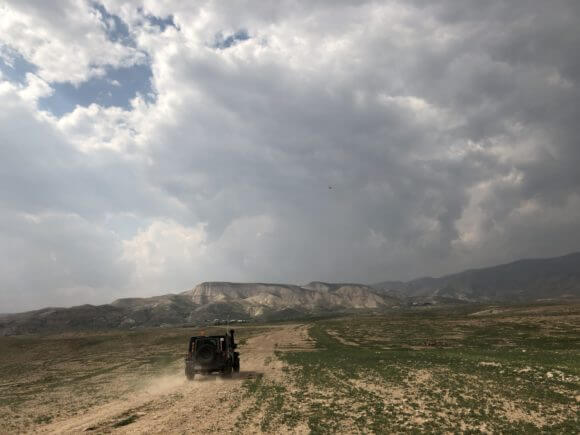 An Israeli army jeep crisscrosses the Jordan Valley, on daily patrol in the area. (Photo: Antony Loewenstein)