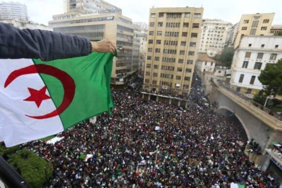 Algerians gather for a demonstration in Algiers, Friday, March 8, 2019