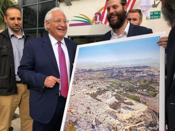 U.S. Ambassador to Israel David Friedman being gifted with an altered image of the Haram al-Sharif/Temple Mount with the Al-Aqsa Mosque and Dome of the Rock replaced with a Jewish temple, May 2018. (Photo: Israel Cohen/Kikar HaShabbat)