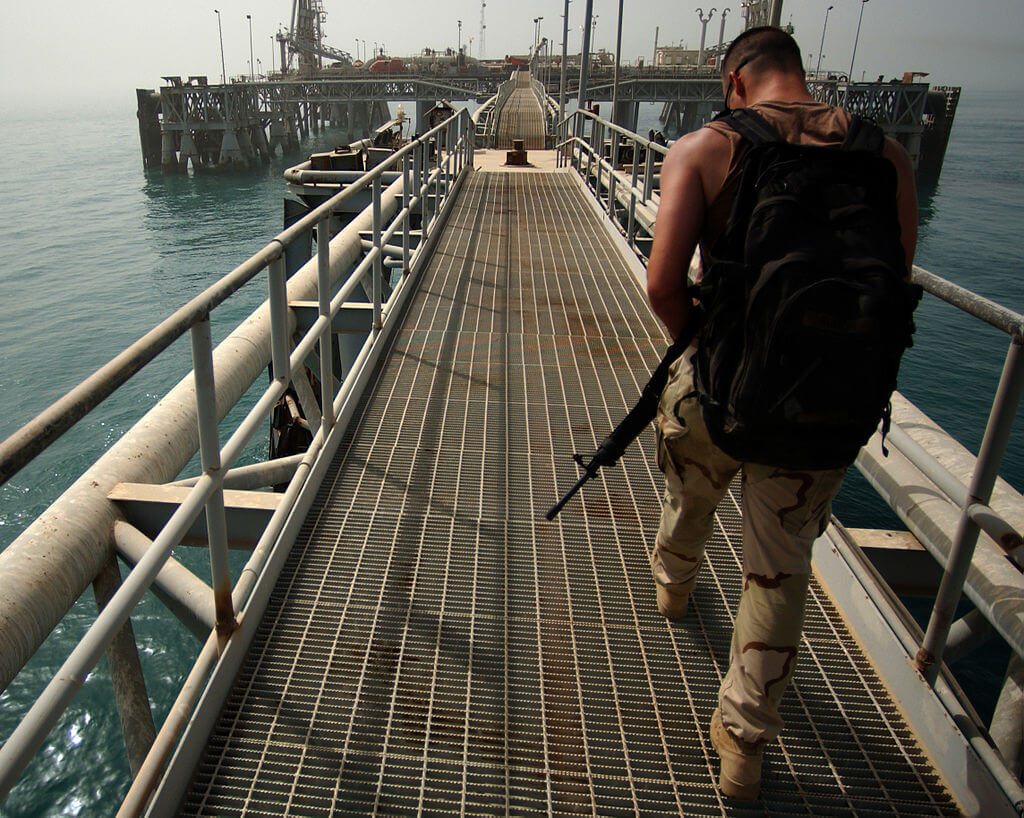 U.S. Navy soldier on Iraq’s Mina al Bakr Oil Terminal in 2003. (Photo by PH1 Shane T. McCoy/US Navy)