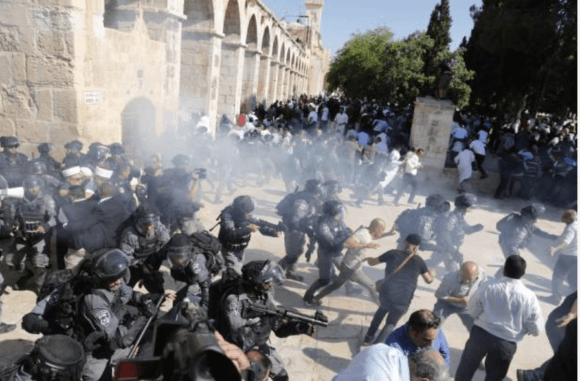 Israeli police fire sound grenades inside the Al-Aqsa Mosque compound in the Old City of Jerusalem on August 11, 2019, as clashes broke out during the overlapping Jewish and Muslim holidays of Eid al-Adha and the Tisha B'av holdiay. (Photo: Ahmad Gharbali/AFP/Getty Images)