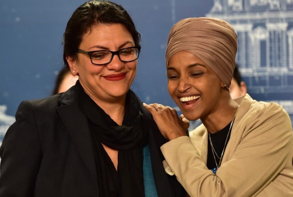Democratic U.S. Representatives Ilhan Omar, right, and Rashida Tlaib enjoy a supportive moment during a news conference at the State Capitol in St. Paul on Monday, Aug. 19, 2019. (Photo: John Autey / Pioneer Press)