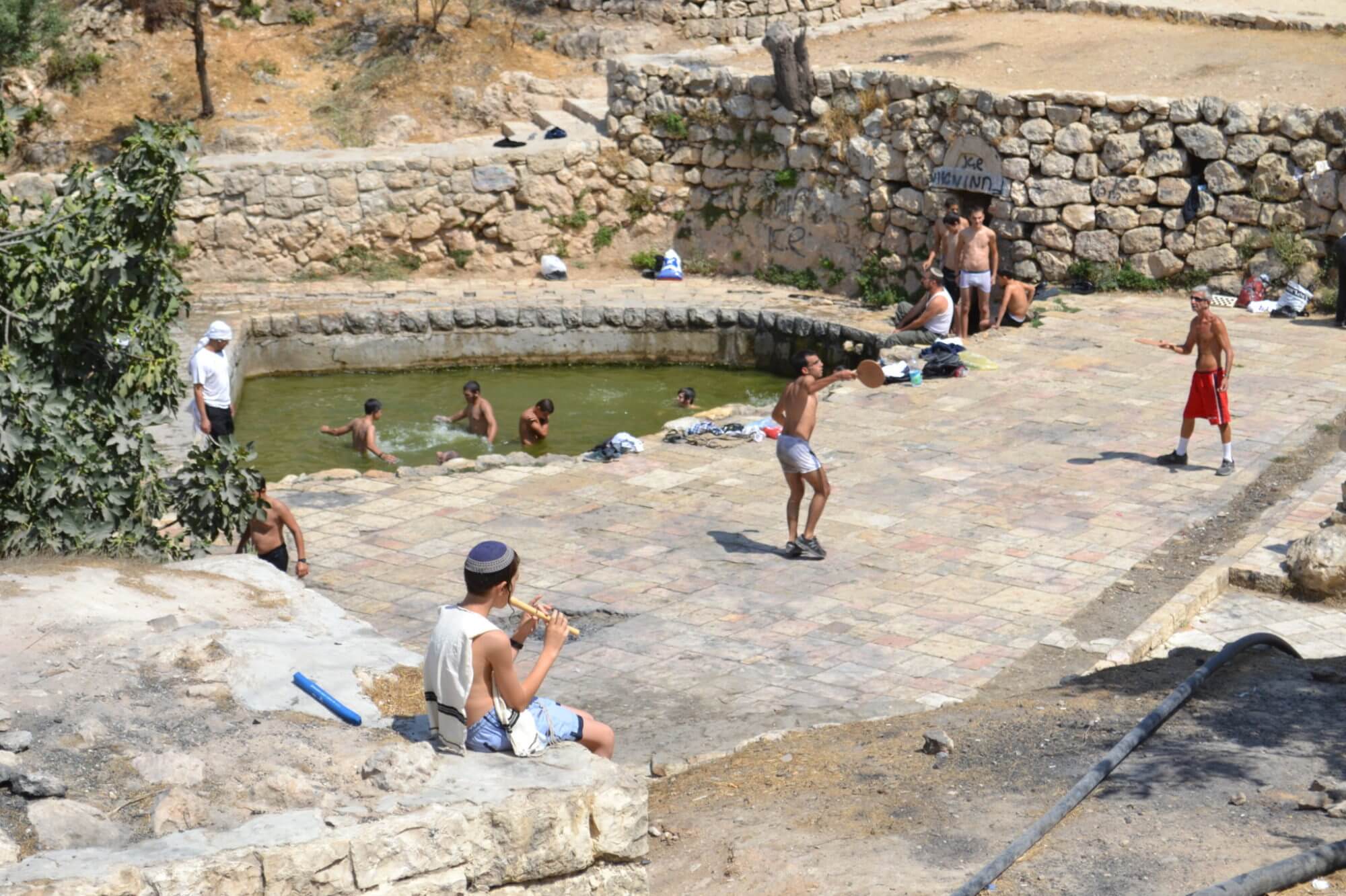 On the edge of downtown Jerusalem, among the ruins of the Palestinian village Lifta, Israeli Jews enjoy natural spring waters that once were central to the life of the village