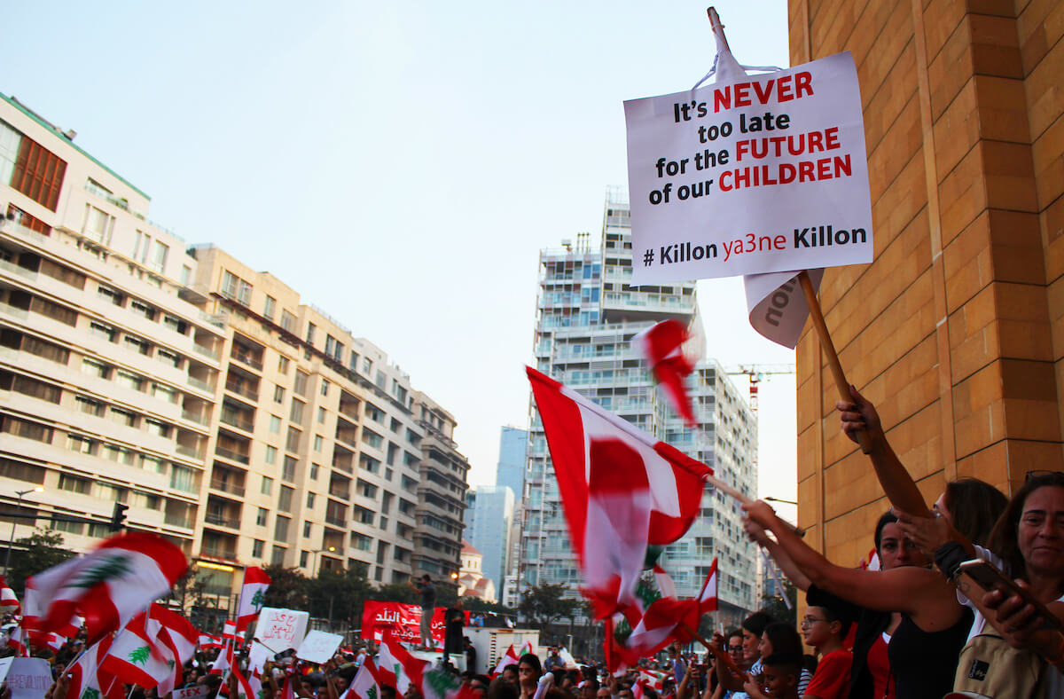 Lebanese demonstrators take part in a protest against dire economic conditions in Beirut on October 22, 2019. (Photo: Fatima Abdullah/APA Images)