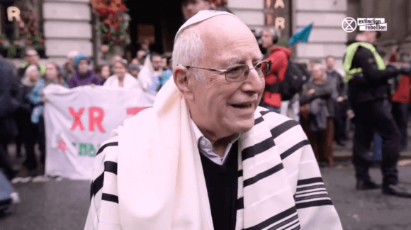 Still of Rabbi Jeffrey Newman at Extinction Rebellion protest, London 2019 (Video: Extinction Rebellion)