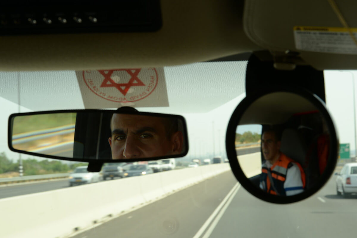 A Magen David Adom special medic glances in the rearview mirror of his ambulance during a training exercise, May 20, 2014. (Photo: U.S. Air Force photo by Staff Sgt. Joe W. McFadden/Released)