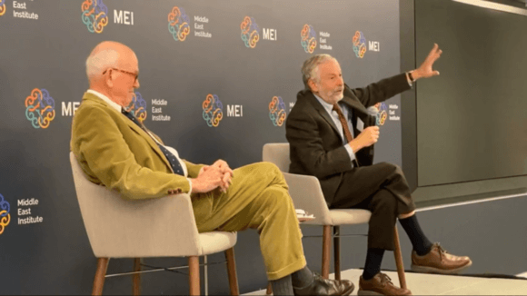 Ian Lustick, right, addressing Middle East Institute in December 2019. Retired ambassador Phil Wilcox is at left.