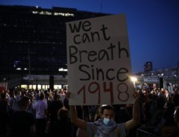 A demonstrator holds up a sign during an anti-annexation protest in Tel Aviv on June 6th, 2020. (photo: Twitter)