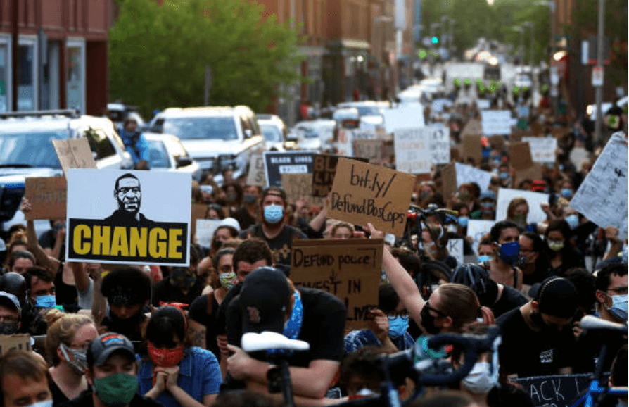 Protesters gather in front of the Boston Police District E-13 Jamaica Plain office during a protest on June 04, 2020 in Boston, Massachusetts. The protests were in response to the death of George Floyd who is black, while in the custody of the Minneapolis, Minnesota police. (Photo: Maddie Meyer/Getty Images)